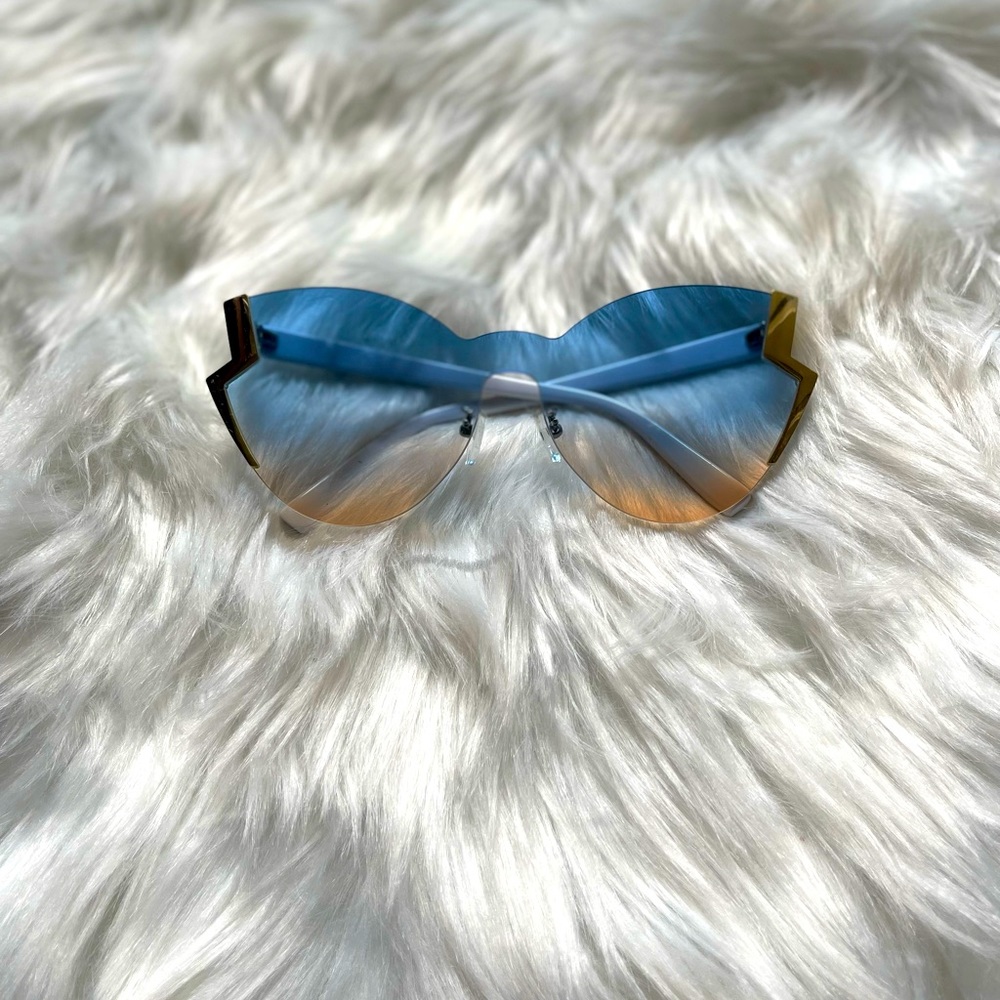 Never worn Sunglasses